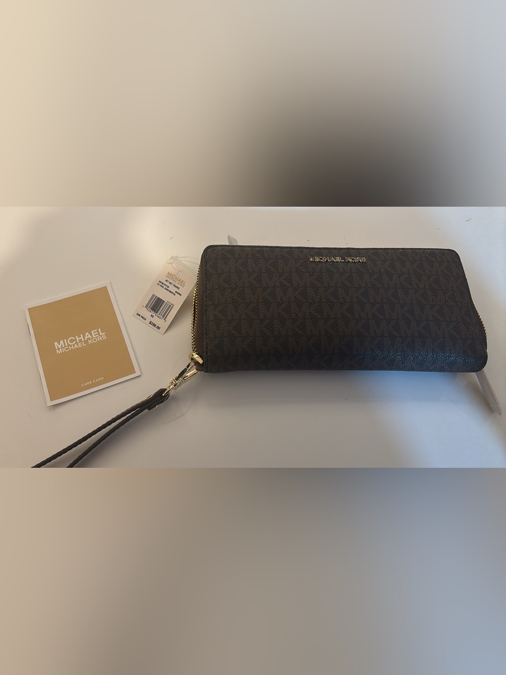 Michael Kors Dark Brown Signature Zip Wristlet with Gold Hardware